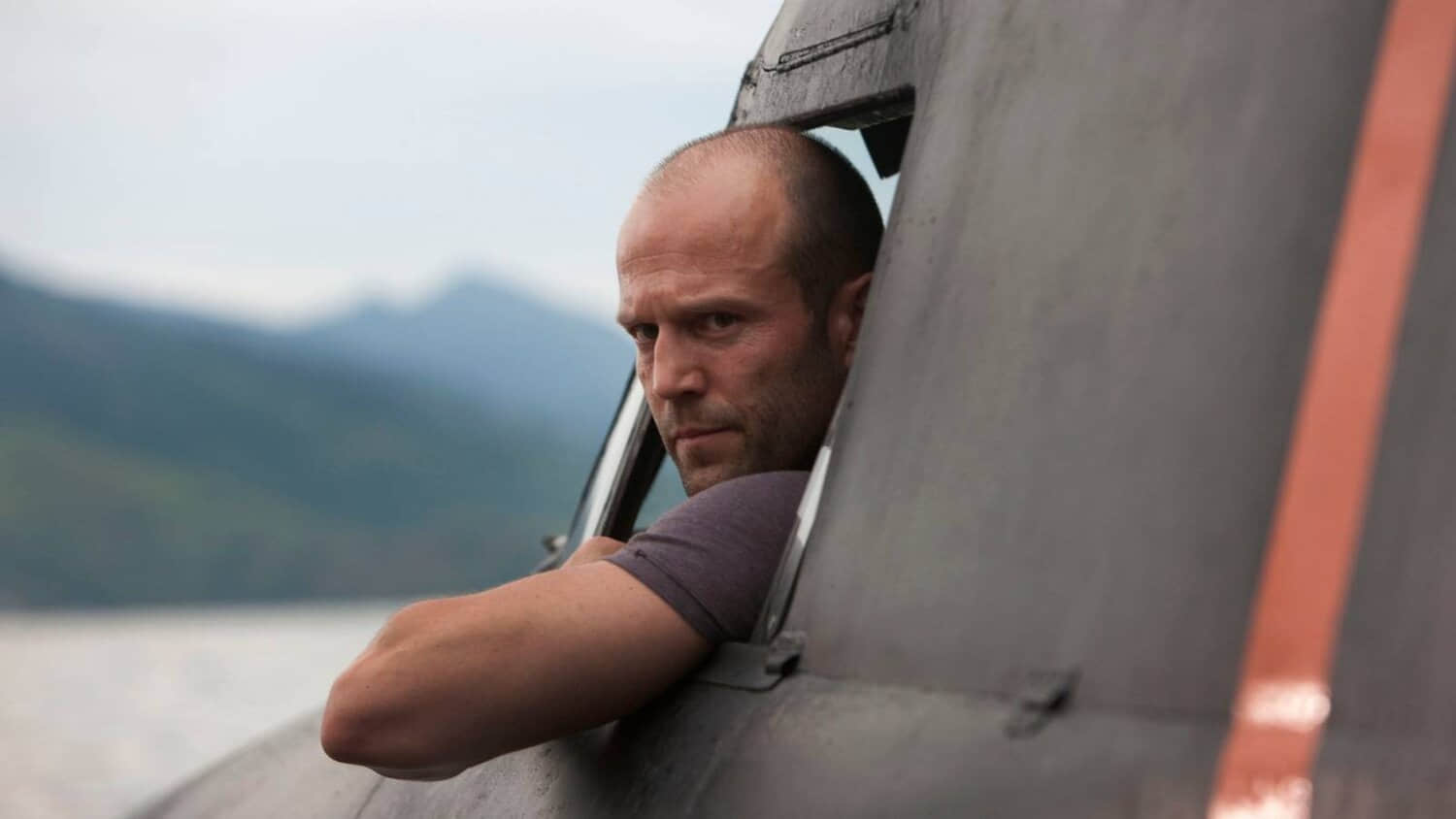 jason-statham-driving-a-truck-in-the-expendables.jpeg