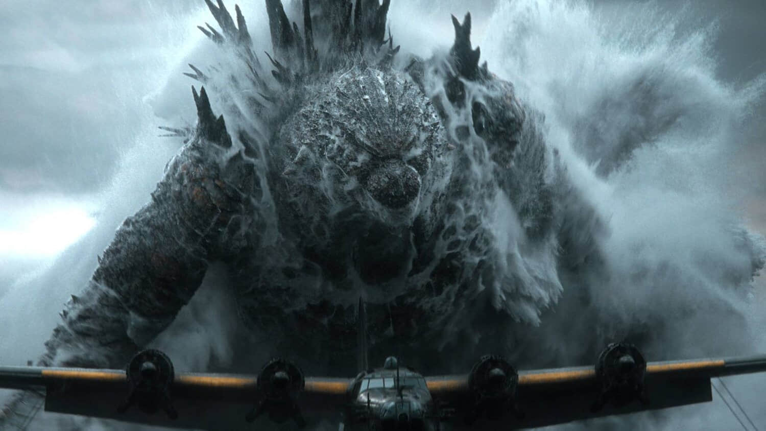 godzilla-emerging-from-the-water-behind-an-airplane-in-godzilla-minus-zero.jpeg