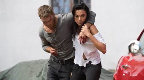assets/alan-ritchson-and-christina-ochoa-in-blood-drive.jpeg