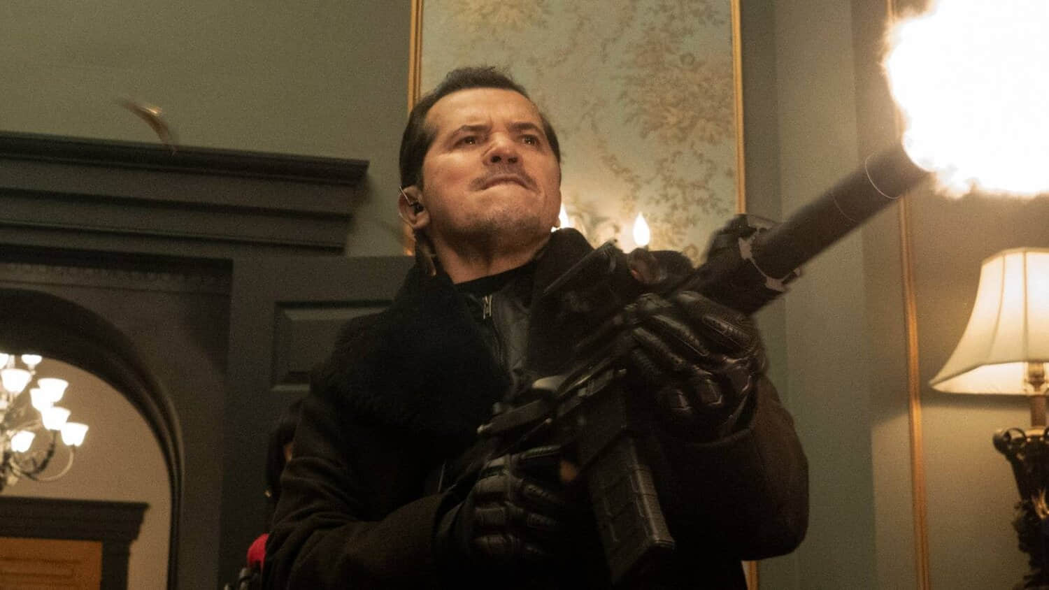 john-leguizamo-shooting-up-the-house-in-violent-night.jpeg