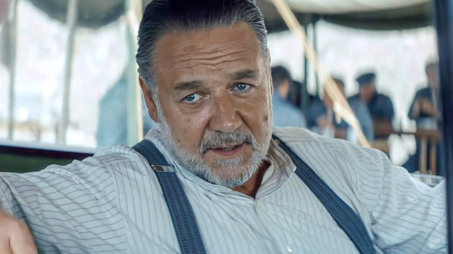 russell-crowe-sitting-behind-the-wheel-of-a-car-in-the-weight-2026.jpeg