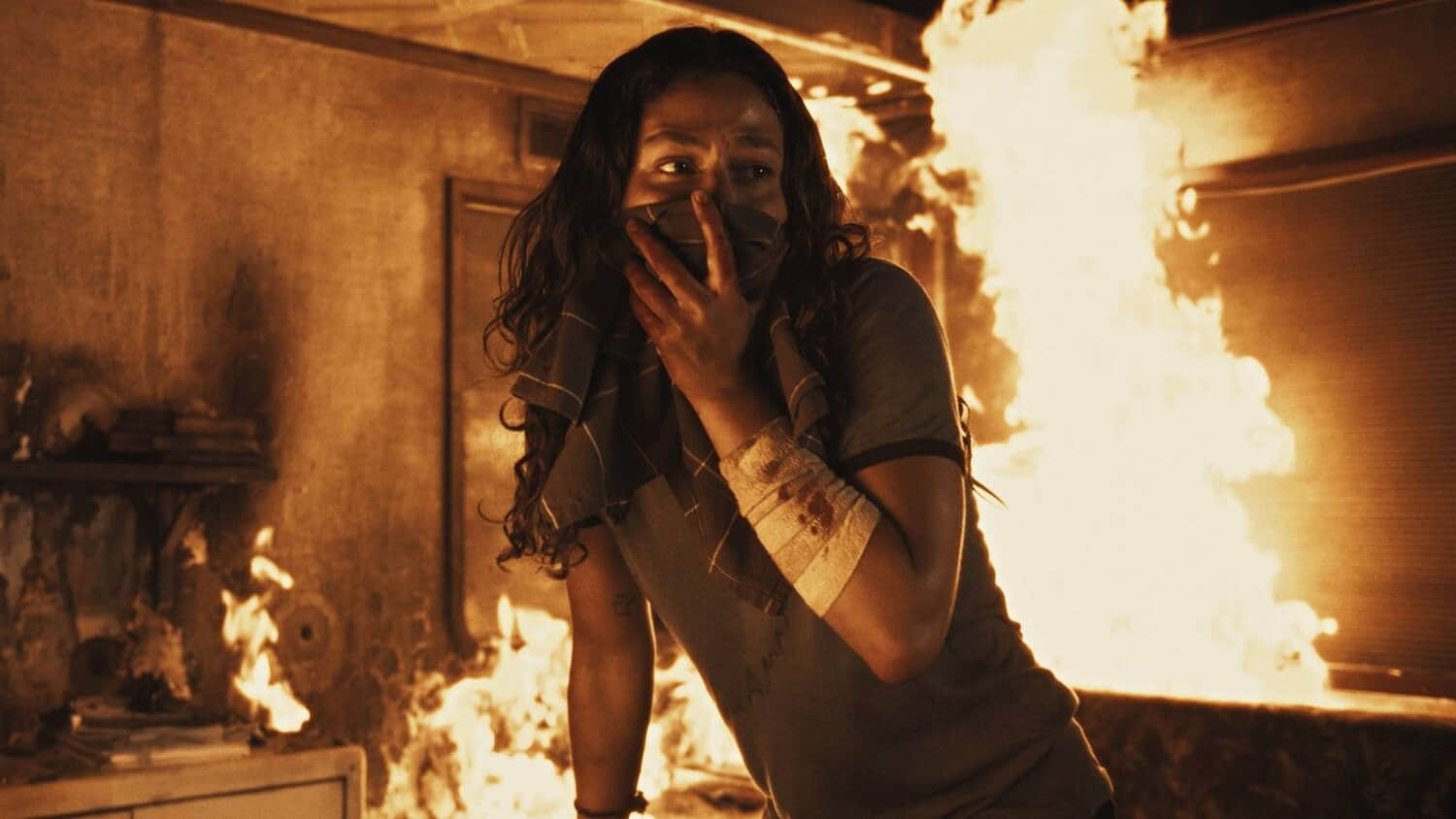 a-woman-covers-herself-in-a-fire-in-the-show-city-of-blood.jpeg
