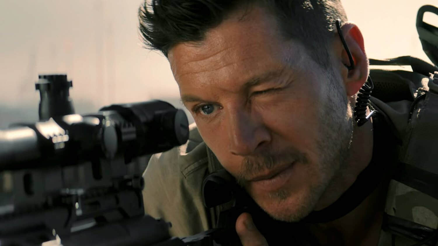 a-sniper-peering-through-his-sights-in-sniper-no-nation.jpeg