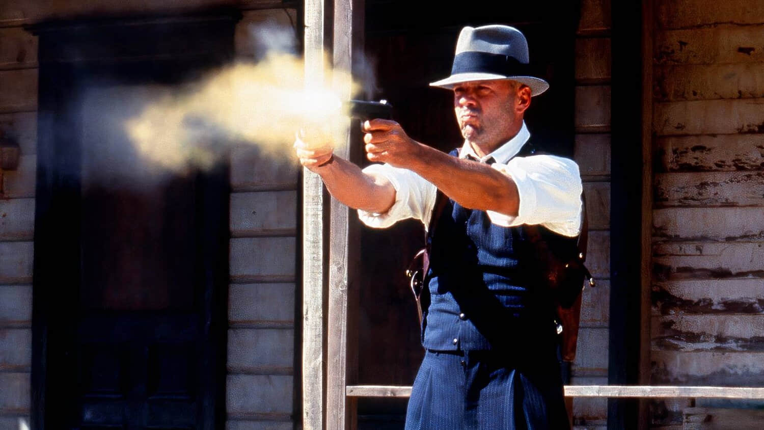 bruce-willis-firing-dual-pistols-in-last-man-standing-1996.jpeg