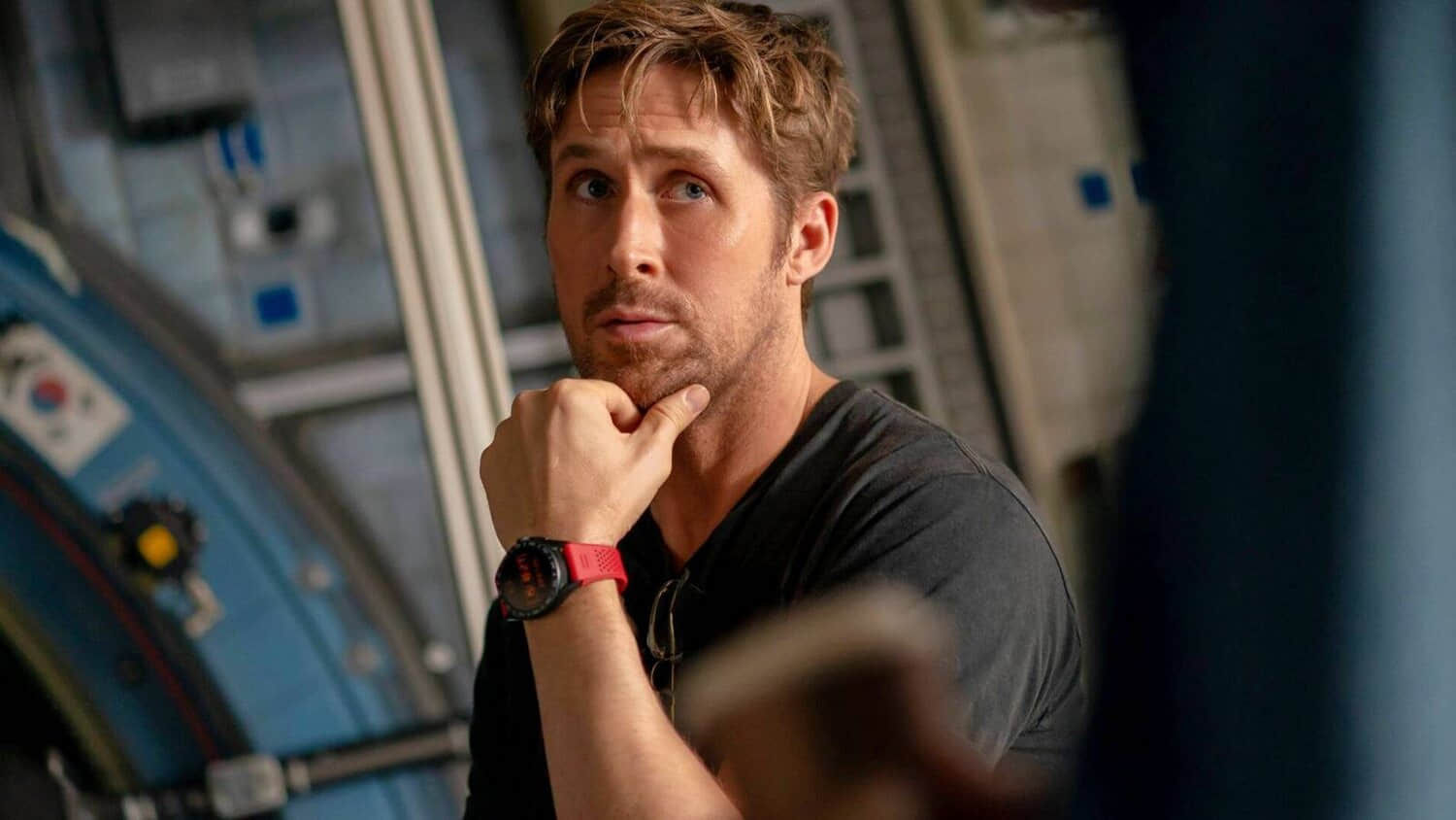 ryan-gosling-rubbing-his-chin-in-a-promotional-image-from-project-hail-mary.jpeg