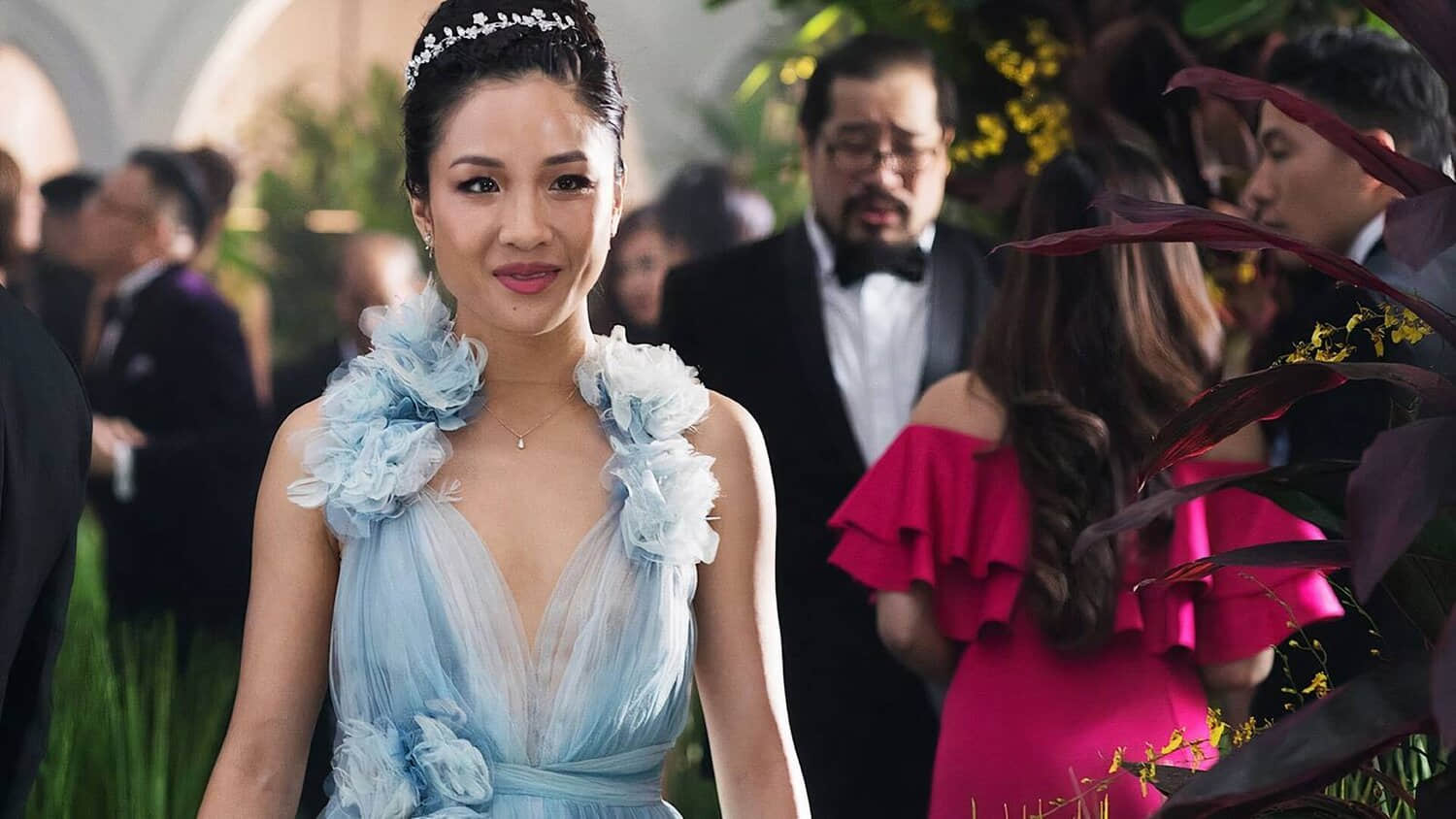 a-woman-in-a-blue-dress-in-crazy-rich-asians.jpeg